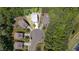 Aerial view of a single-Gathering home on a cul-de-sac surrounded by mature trees and landscaping at 233 Hammond Wood Place, Morrisville, NC 27560