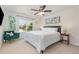 Comfortable bedroom with neutral carpet and decor and a sitting chair at 233 Hammond Wood Place, Morrisville, NC 27560