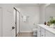 Bright bathroom with a glass-enclosed shower, toilet, and a single-sink vanity at 240 Amber Acorn Ave, Raleigh, NC 27603