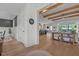 Inviting living space flowing into an open-concept kitchen and dining area, perfect for gatherings at 2408 Eddie Howard Rd, Willow Springs, NC 27592