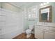 Bathroom with shower-tub combo, large mirror, and double sink vanity at 2412 Mollynick Lane Ln, Wake Forest, NC 27587