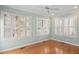 Bedroom with hardwood floors and plantation shutters at 2412 Mollynick Lane Ln, Wake Forest, NC 27587