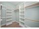 Spacious walk-in closet with custom shelving and ample storage at 2412 Mollynick Lane Ln, Wake Forest, NC 27587