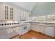 Charming kitchen with white cabinets, hardwood floors, and granite countertops at 2412 Mollynick Lane Ln, Wake Forest, NC 27587