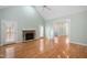 Open living room with fireplace and hardwood floors at 2412 Mollynick Lane Ln, Wake Forest, NC 27587