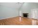 Cozy living room with fireplace and hardwood floors at 2412 Mollynick Lane Ln, Wake Forest, NC 27587