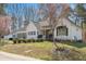 Desirable home with blooming trees, established landscaping, and a traditional design at 2420 Mollynick Ln, Wake Forest, NC 27587