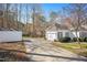 Detached two car garage with extra shed and paved driveway at 2420 Mollynick Ln, Wake Forest, NC 27587