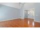Bright and airy living room featuring hardwood floors and a high, vaulted ceiling at 2420 Mollynick Ln, Wake Forest, NC 27587