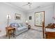 Charming bedroom with comfortable sofa, neutral color scheme, and natural lighting at 2617 Cottage Cir, Raleigh, NC 27613
