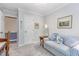 Comfortable bedroom with carpeting, neutral tones, and convenient access to other rooms at 2617 Cottage Cir, Raleigh, NC 27613