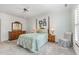 Inviting bedroom with a four-poster bed, soft carpet, and coordinated decor at 2617 Cottage Cir, Raleigh, NC 27613