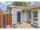 Exterior view of a shed, patio, and back door with a storm door at 2617 Cottage Cir, Raleigh, NC 27613