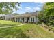 Charming home with landscaped front yard featuring colorful flower beds, a welcoming walkway, and lovely curb appeal at 2617 Cottage Cir, Raleigh, NC 27613
