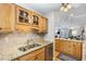 Functional kitchen with updated sink, granite counters, stainless dishwasher, and ample storage at 2617 Cottage Cir, Raleigh, NC 27613