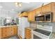 Well-maintained kitchen with granite counters, stainless appliances, and ample cabinet space at 2617 Cottage Cir, Raleigh, NC 27613