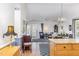 Open-concept living space with wood floors, neutral colors, and ample natural light at 2617 Cottage Cir, Raleigh, NC 27613