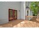 Back deck featuring glass door and a bay window with a view at 3008 Isabella Dr, Raleigh, NC 27603
