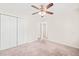 Neutral bedroom with closet featuring double doors and neutral carpet at 3008 Isabella Dr, Raleigh, NC 27603