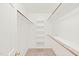 Walk-in closet with shelving and hanging rods at 3008 Isabella Dr, Raleigh, NC 27603