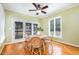 Cozy breakfast nook with a round table, wicker chairs, and views of the backyard at 313 Shetland Rd, Rougemont, NC 27572