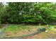 Fenced backyard showing the garden bed at 3517 Morningside Dr, Raleigh, NC 27607