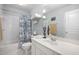 Bright bathroom with white vanity, neutral wall color, and tile flooring at 3619 Lion Ridge Ct, Raleigh, NC 27612