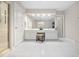 Primary bathroom featuring double sink vanity, tiled floors, and shower at 3619 Lion Ridge Ct, Raleigh, NC 27612
