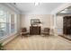 Bright bedroom with neutral walls, carpeted floors, and a large window providing natural light at 3619 Lion Ridge Ct, Raleigh, NC 27612