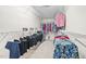 Spacious walk-in closet with ample storage and metal storage racks at 3619 Lion Ridge Ct, Raleigh, NC 27612
