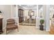 Dining room featuring wooden floors, decorative columns, and a chandelier at 3619 Lion Ridge Ct, Raleigh, NC 27612