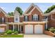 Beautiful brick home with a two-car garage, black shutters, and manicured landscaping at 3619 Lion Ridge Ct, Raleigh, NC 27612
