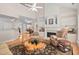 Bright living room featuring a fireplace, vaulted ceilings, and hardwood floors at 3619 Lion Ridge Ct, Raleigh, NC 27612