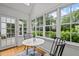 Cozy breakfast nook bathed in natural light, perfect for enjoying morning coffee or casual meals with serene views at 3816 Dover Rd, Durham, NC 27707