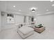 Bright and spacious living room designed for relaxation, featuring neutral tones, comfortable seating, and recessed lighting at 3816 Dover Rd, Durham, NC 27707