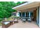 Outdoor deck provides a relaxing setting with comfortable seating and scenic views of the surrounding landscape at 382 Valley Ln, Pittsboro, NC 27312