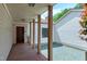 A welcoming front porch features a stone entrance and decorative door with accent lighting at 382 Valley Ln, Pittsboro, NC 27312