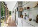 Bright hallway with lots of natural light and wooden floors at 382 Valley Ln, Pittsboro, NC 27312