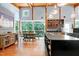 Bright, spacious kitchen with a center island, dining table, and natural light at 382 Valley Ln, Pittsboro, NC 27312