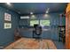 This cozy office is equipped with built-ins and a bright window with tree views at 382 Valley Ln, Pittsboro, NC 27312