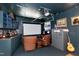Entertainment space includes theater setup, comfortable seating, and stylish decor at 382 Valley Ln, Pittsboro, NC 27312