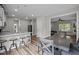Cozy dining area blends into the kitchen with counter seating and open to living areas at 412 Carr Store Rd, Cedar Grove, NC 27231