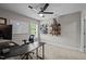 This well-lit office space has large desk, modern shelving, and a whiteboard for brainstorming at 412 Carr Store Rd, Cedar Grove, NC 27231