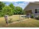 Large backyard with a wooden fence and mature trees at 50 Viajar Way, Smithfield, NC 27577