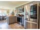 Well-equipped kitchen with stainless steel appliances and open view to the dining area at 50 Viajar Way, Smithfield, NC 27577