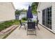 Back yard features a patio set with umbrella perfect for outdoor entertaining and enjoyment at 505 Stratton Way, Durham, NC 27704