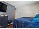 Comfortable bedroom with dark accent wall features wood floors, perfect for relaxing at 505 Stratton Way, Durham, NC 27704