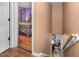 View into a cozy bedroom; the stairs lead down to the dining room at 505 Stratton Way, Durham, NC 27704