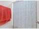 Bathroom with a colorful shower curtain and a peach towel at 5113 Ranger Grove Way, Raleigh, NC 27604