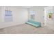 Cozy bedroom with two windows and carpet flooring for comfort at 5113 Ranger Grove Way, Raleigh, NC 27604